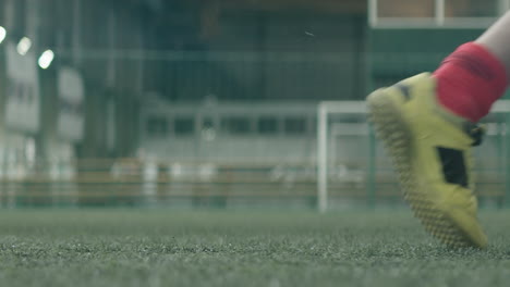 Close-Up-of-Soccer-Player-Kicking-Ball